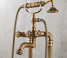 Load image into Gallery viewer, "Arna" Collection - Bathtub Faucet Antique Brass Carved Bath Shower Faucet Hot &amp; Cold Mixer Tap With Handheld Shower Floor Standing Style
